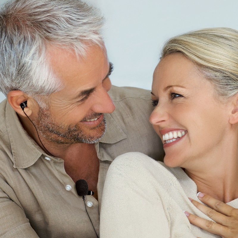 Couple Enjoying their Time Together as the Man can Hear Thanks to the Bellman Audio Microset