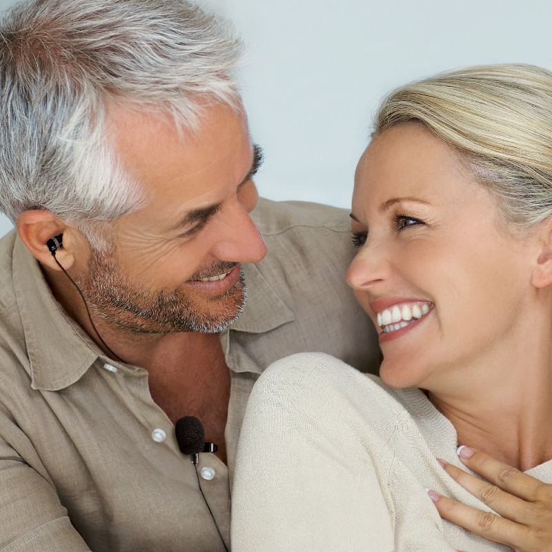 Couple Enjoying their Time Together as the Man can Hear Thanks to the Bellman Audio Microset