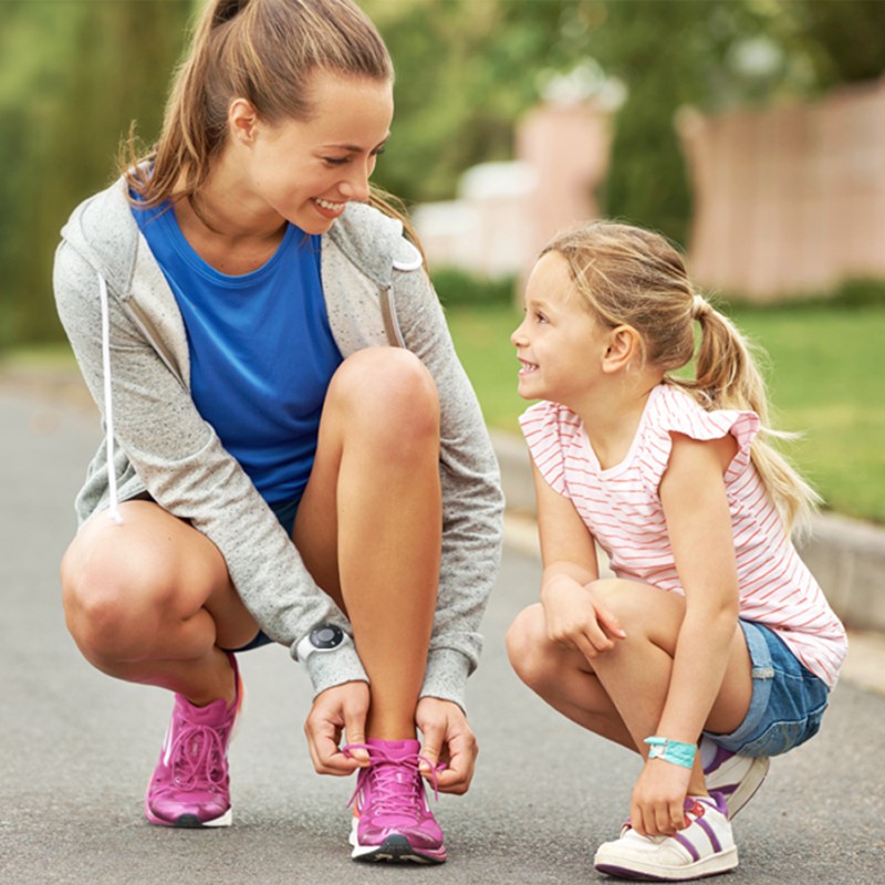 Bellman Visit Wrist Receiver Being Worn By Mother Out With Daughter